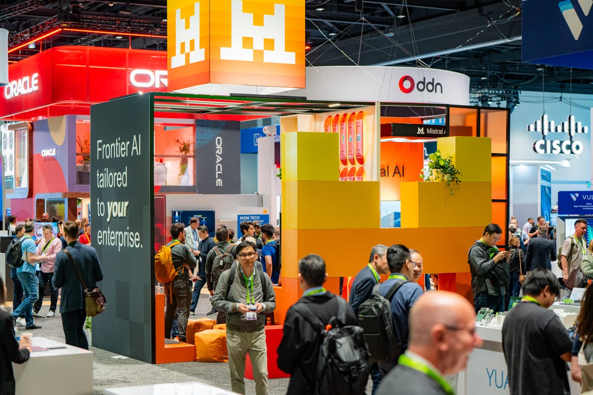 Mistral AI booth surrounded by attendees and neighboring technology brands on the NVIDIA GTC show floor