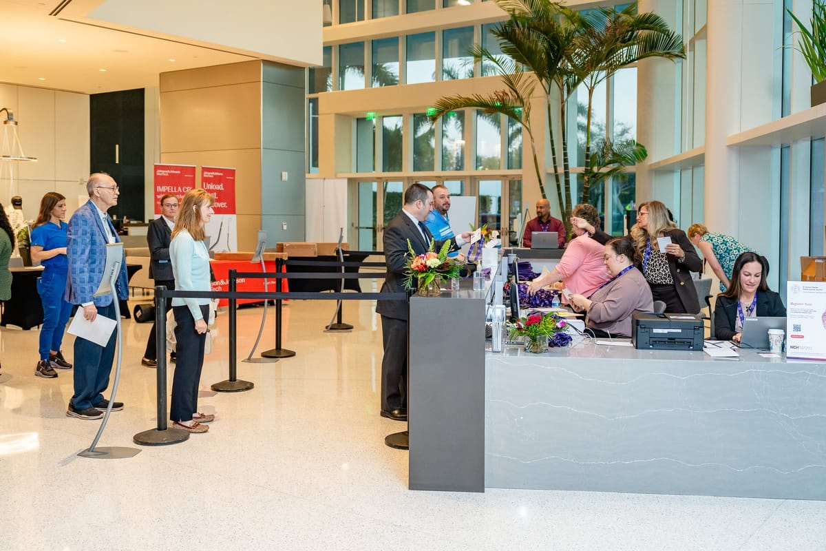 Attendees arriving and checking in at the Naples Cardiovascular Summit