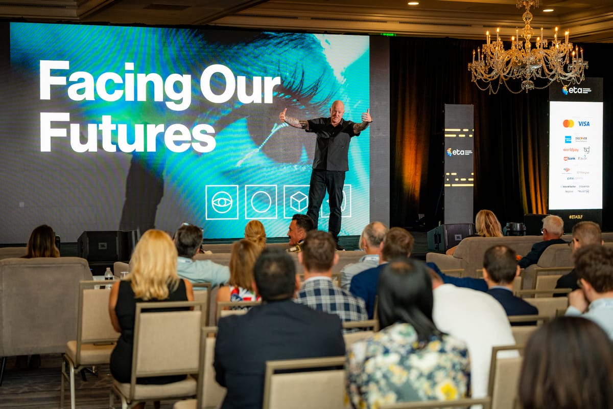 Facing Our Futures keynote speaker addressing a full Strategic Leadership Forum ballroom